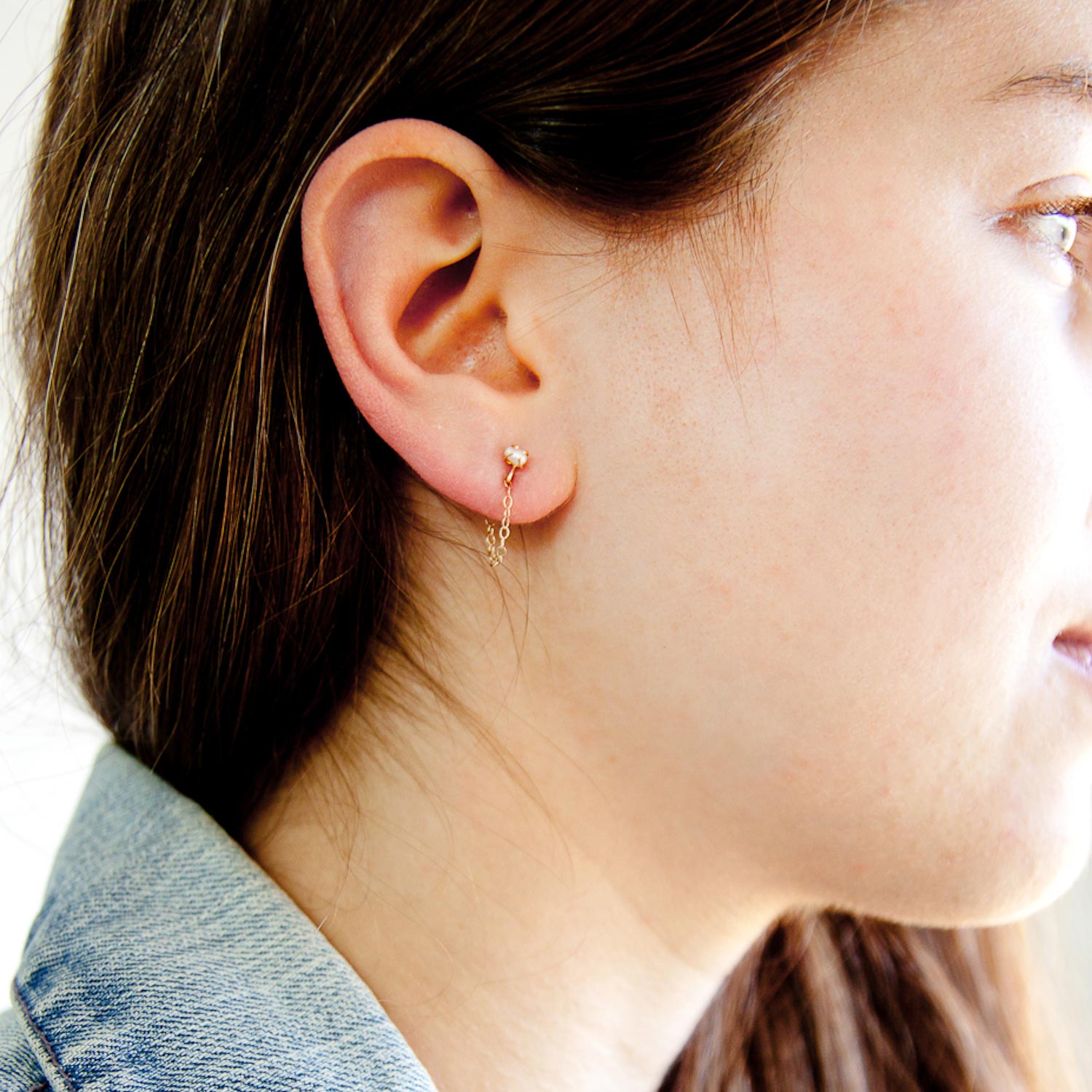 Melissa Joy Manning: 14K yellow gold keshi pearl post with chain earring