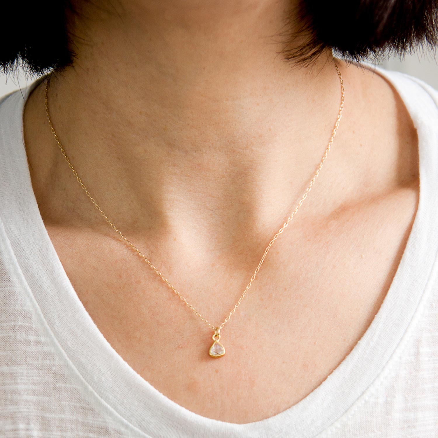 Margery Hirschey: Necklace with 18K gold chain and 22K gold bezel with .50 ct tear drop diamond (smaller)