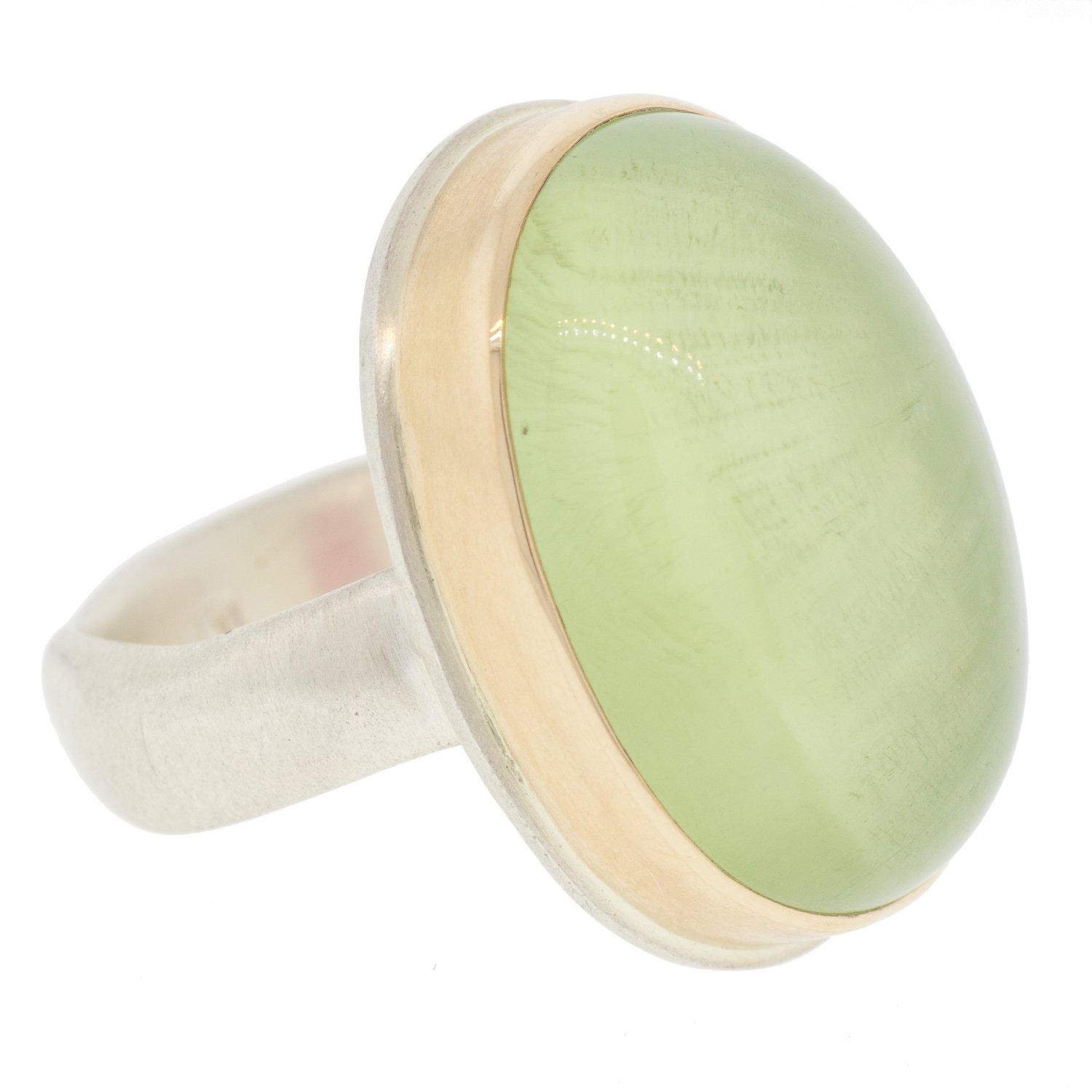 Jamie Joseph: SS & 14k gold ring with vertical oval smooth prehnite on groovy band