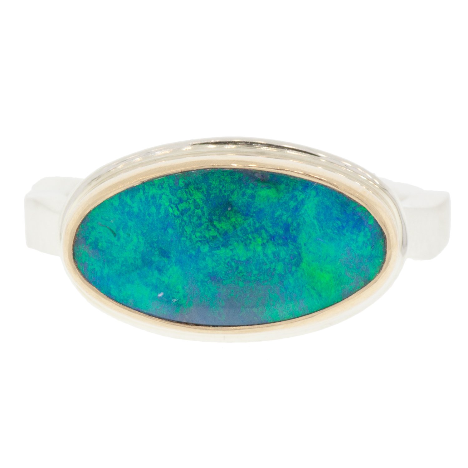 Jamie Joseph: SS & 14k gold ring with small oval Australian opal on medium live edge band