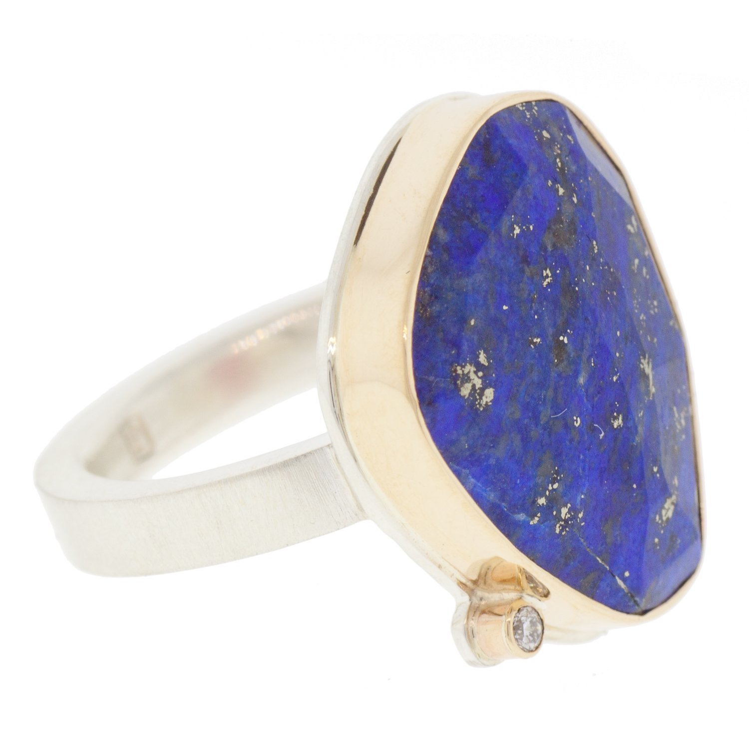 Jamie Joseph: SS & 14k gold ring with vertical asymmetrical lapis and .025ct satellite diamond on X band