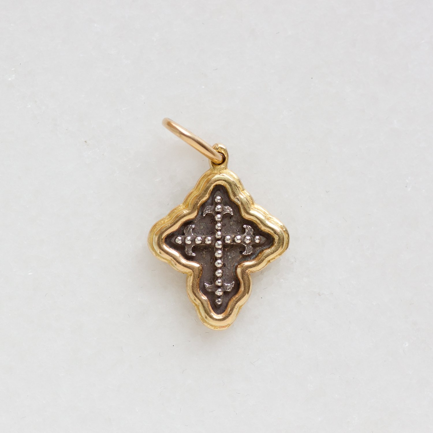 Erica Molinari Trunk Show: ss and 18k tiny baby latin cross
