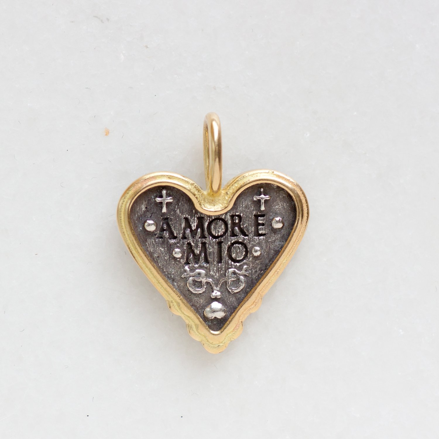Erica Molinari Trunk Show: ss and 18k baby sacred heart