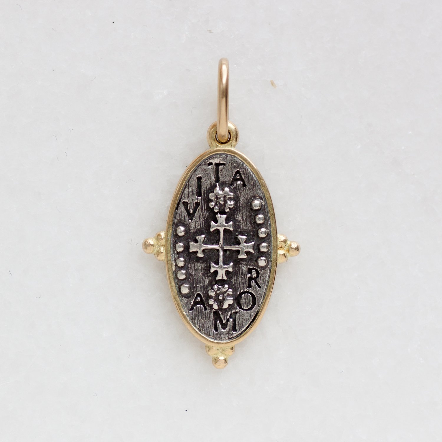Erica Molinari Trunk Show: ss and 18k baby skull, vines and cross