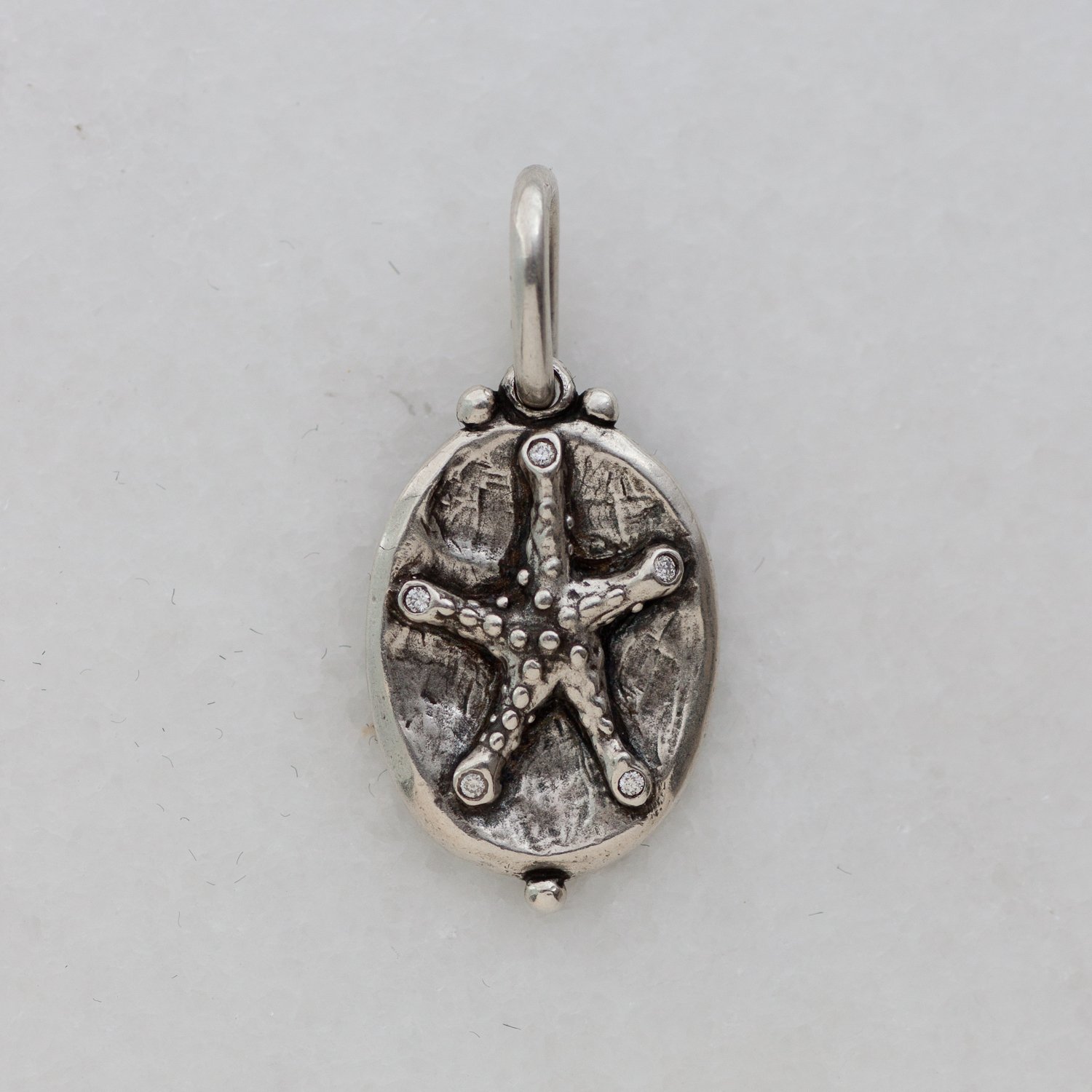 Erica Molinari Trunk Show: ss starfish and seahorse .01cts