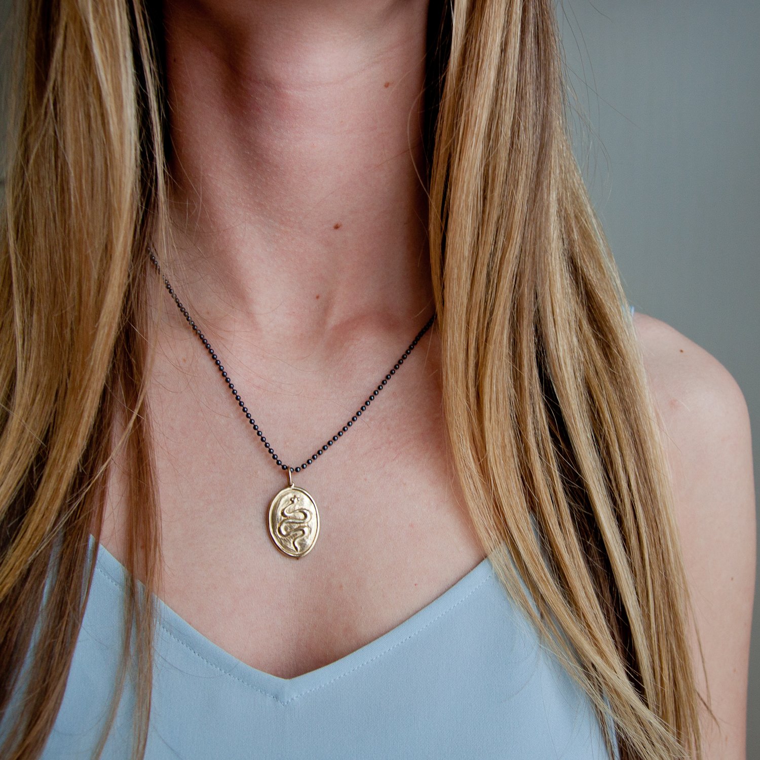 Erica Molinari Trunk Show: 14k snake and swordcross