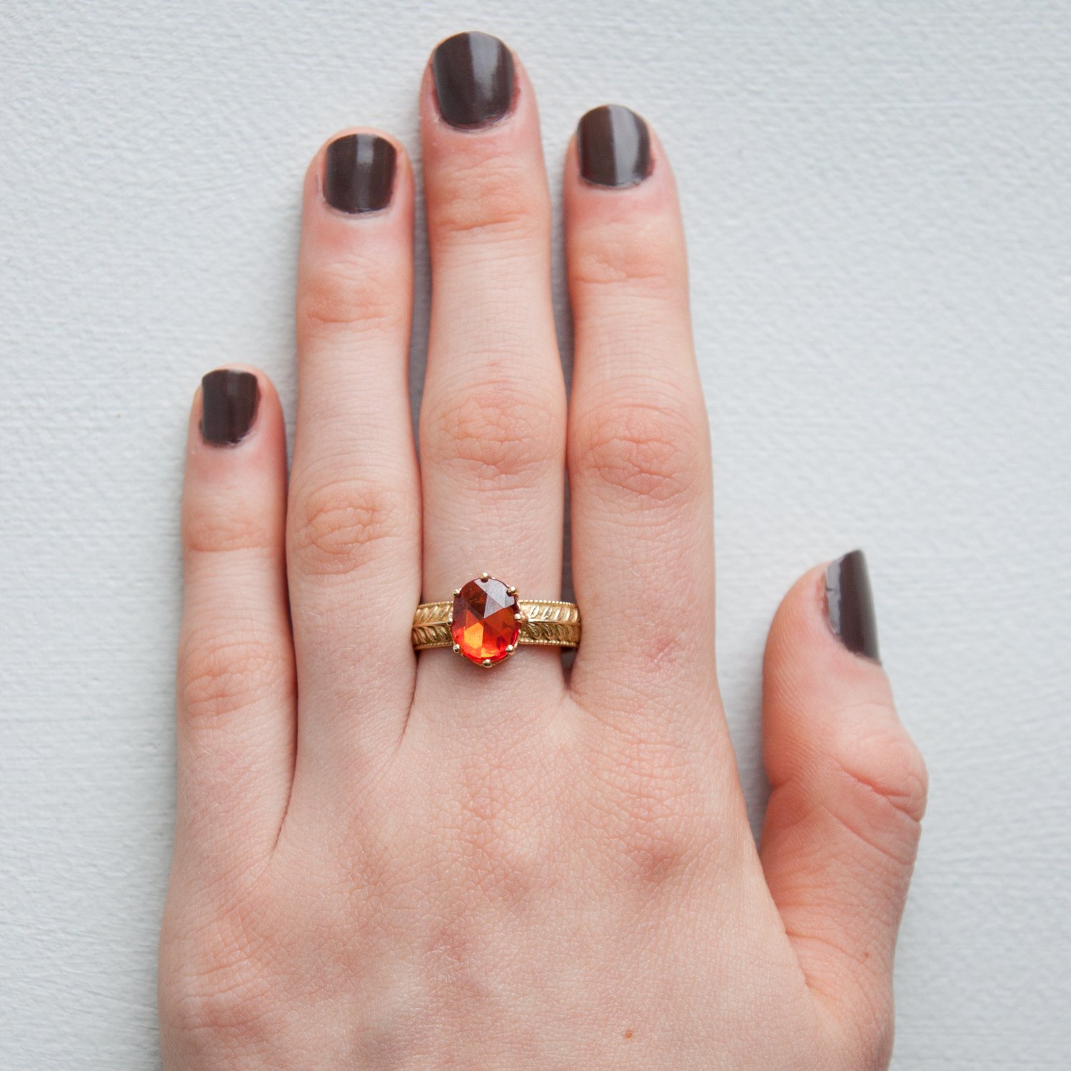Erica Molinari Trunk Show: Ring, Leaf band with Orange sapphire, .2ct, "Live, Love, Life", 18K gold, Size 7
