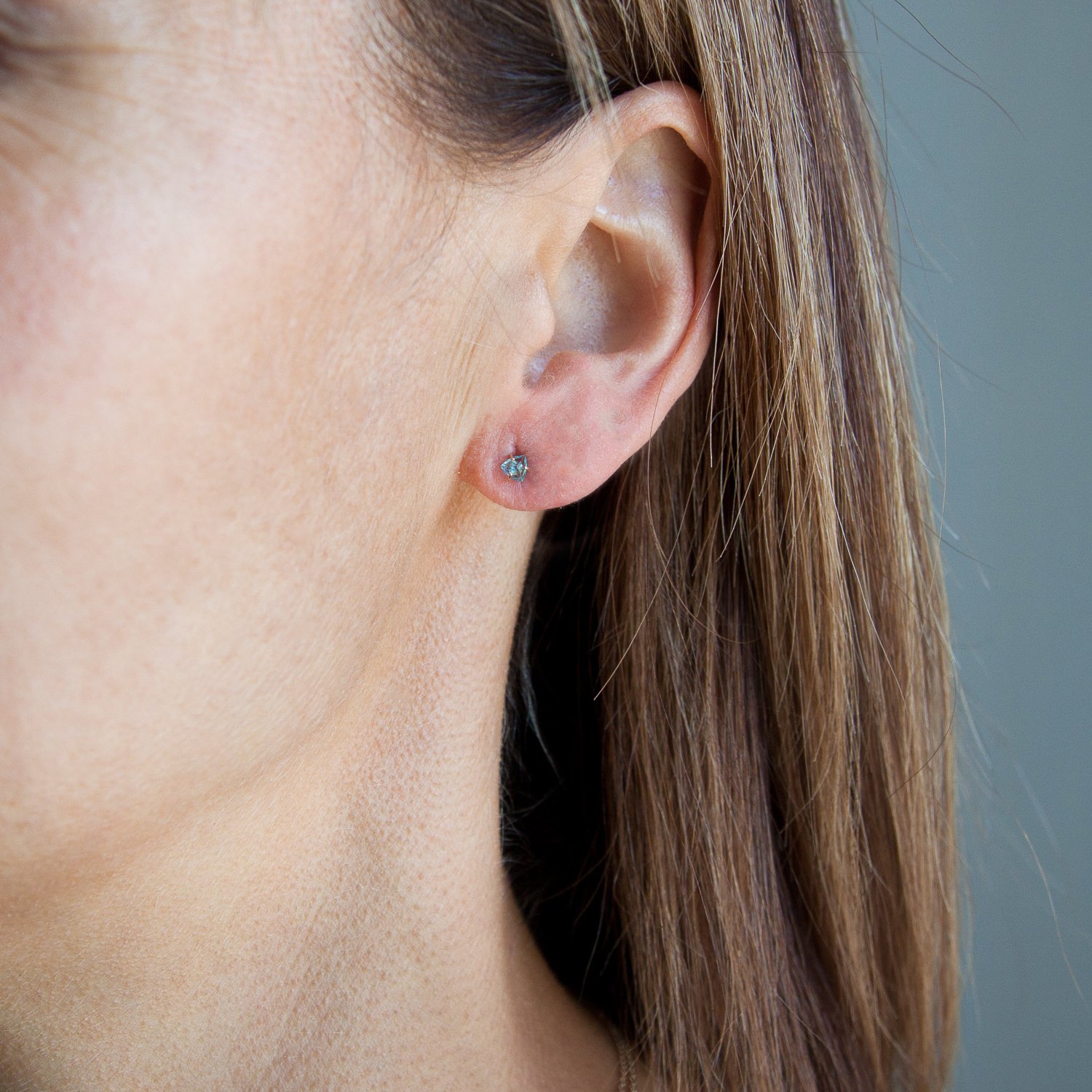 Melissa Joy Manning: Limited edition 14K yellow gold green tanzanite and opal mismatched post earrings