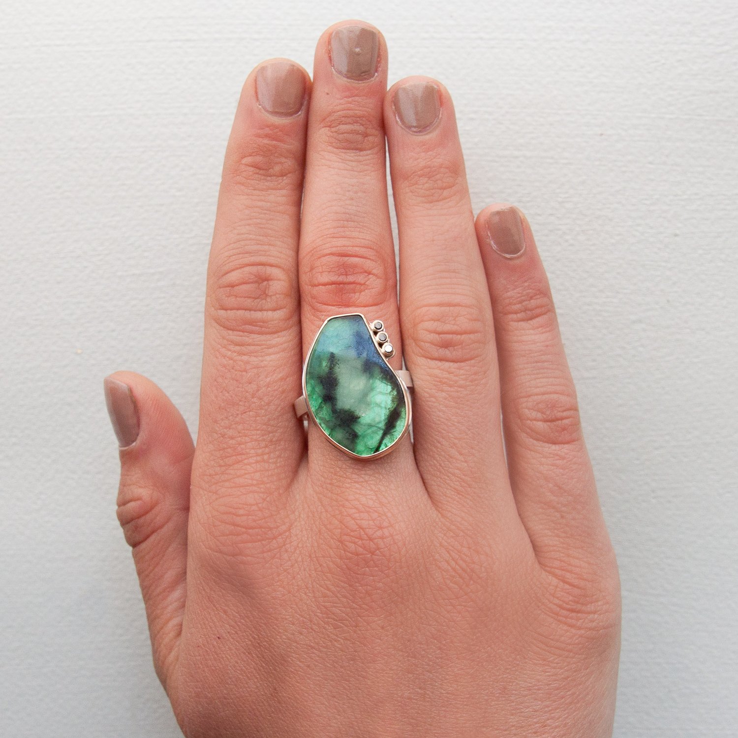 Jamie Joseph: emerald slice vertical asymmetrical ring with triple .025 ct satellite black diamonds on X band sterling silver and 14K gold (.075 TCW) size 7 3/4