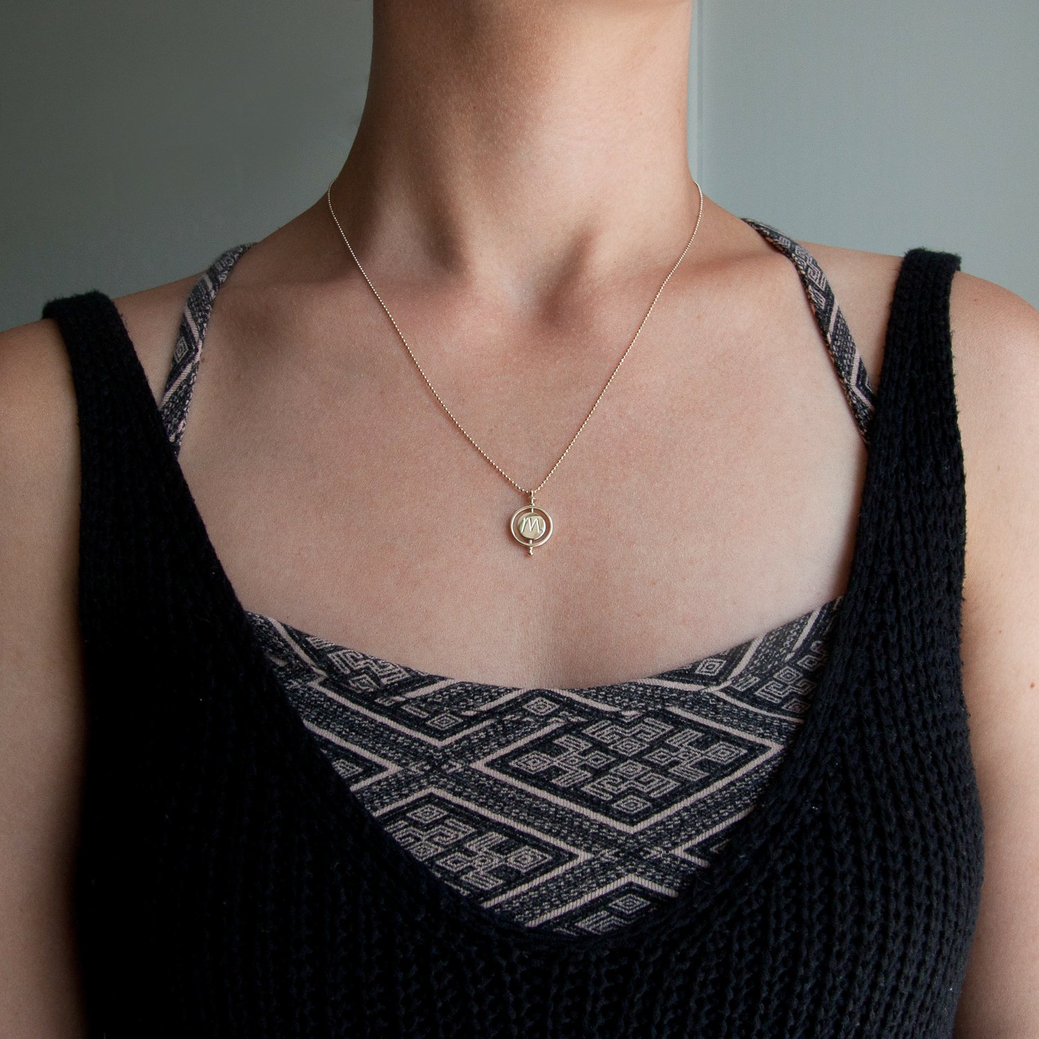 Kismet: M initial medallion necklace with single solitaire .01ct and 3.8gr 14k yellow gold