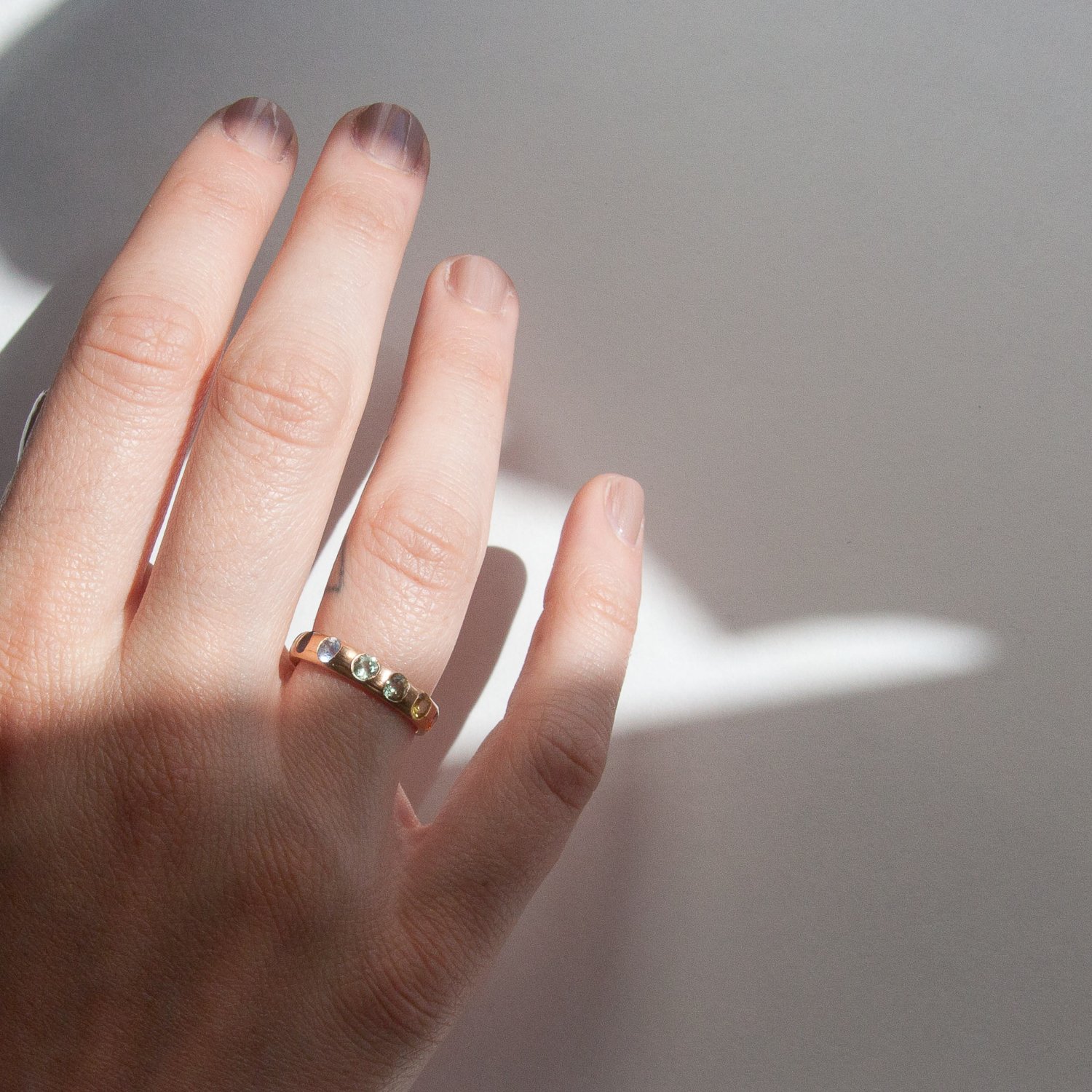 Polly Wales: Narrow Crystal Ring with Rainbow Sapphires in 18K Rose Gold, Size 7