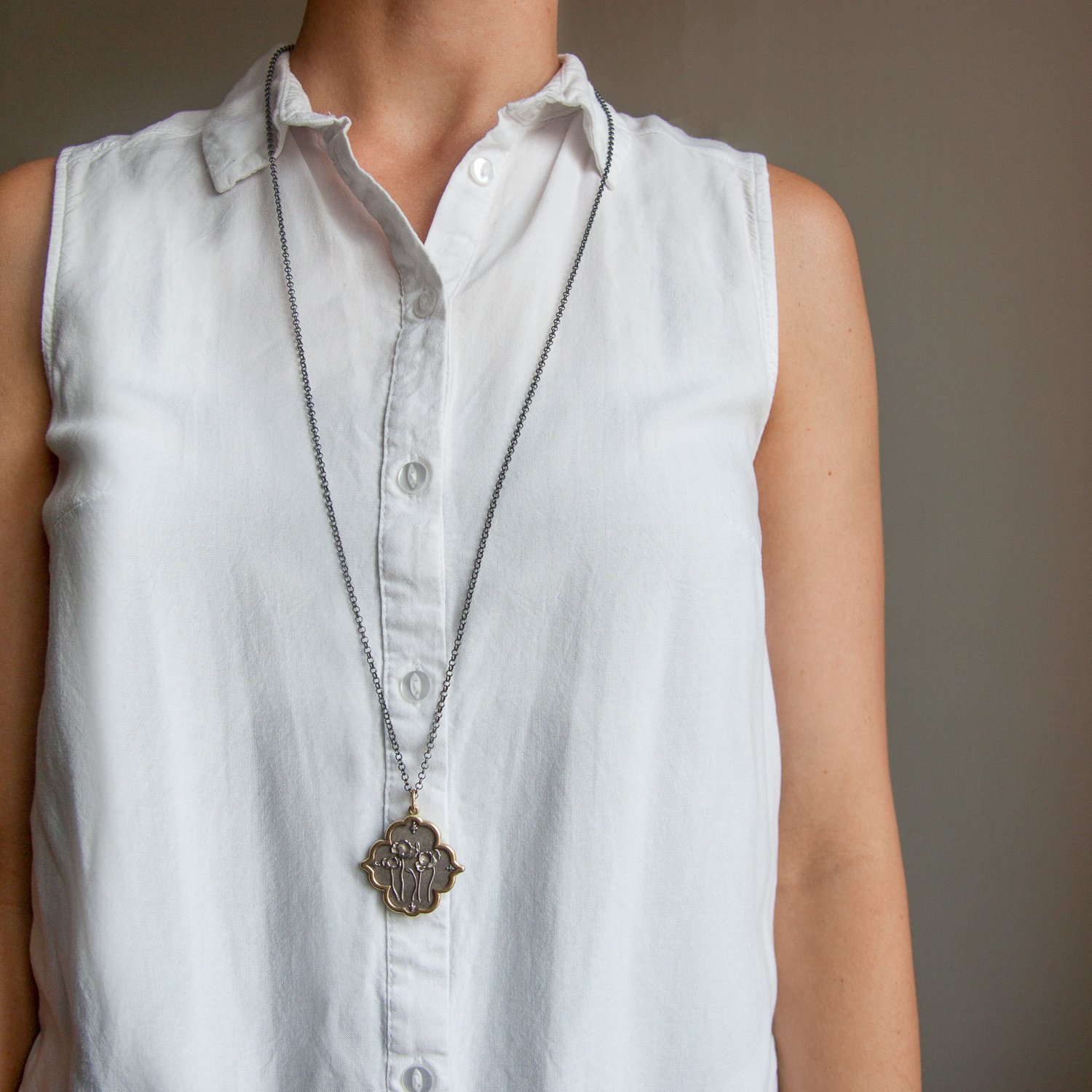 Erica Molinari: SS and 18K large poppy charm, in italian "you never fail until you stop trying"