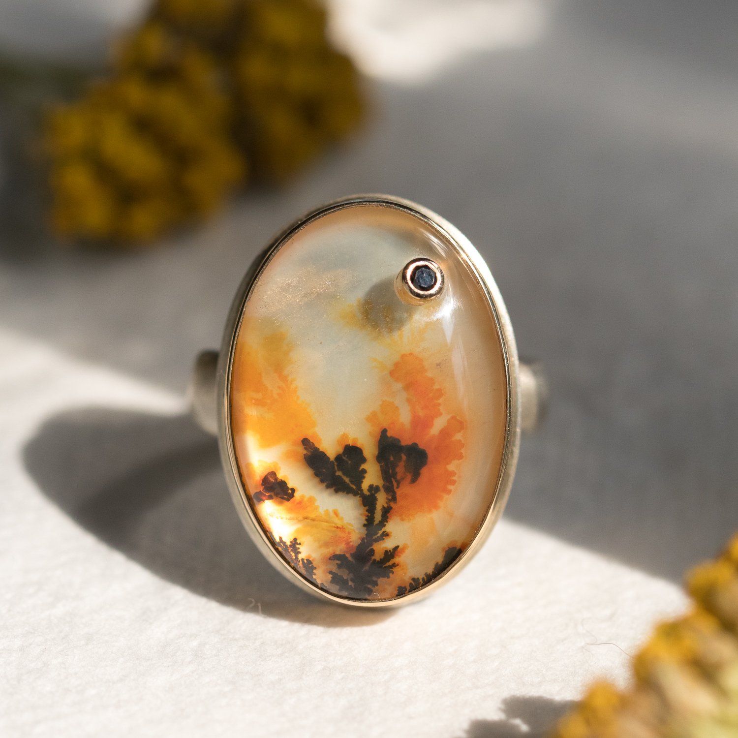 Jamie Joseph: SS & 14k gold ring with vertical oval smooth dendritic agate and .03ct black diamond on groovy band size 7
