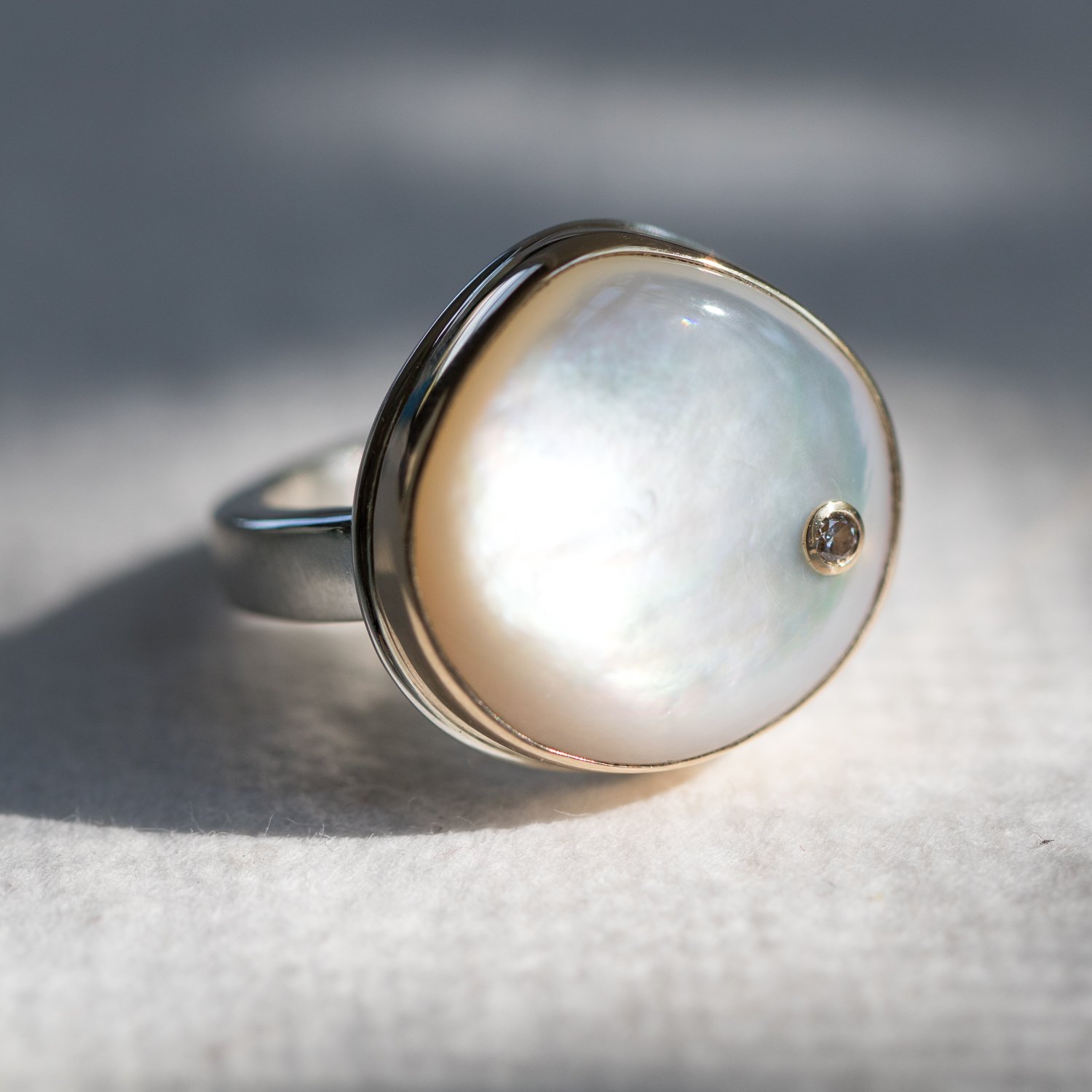 Jamie Joseph: SS & 14K w/ smooth asymmetrical mother of pearl & .03ct diamond on skinny smooth band