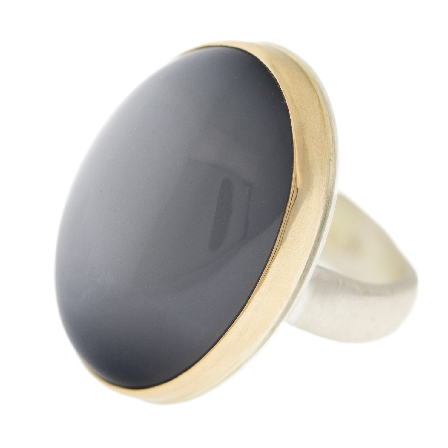 Jamie Joseph: SS & 14k gold w/ large vertical oval smooth grey moonstone on groovy band