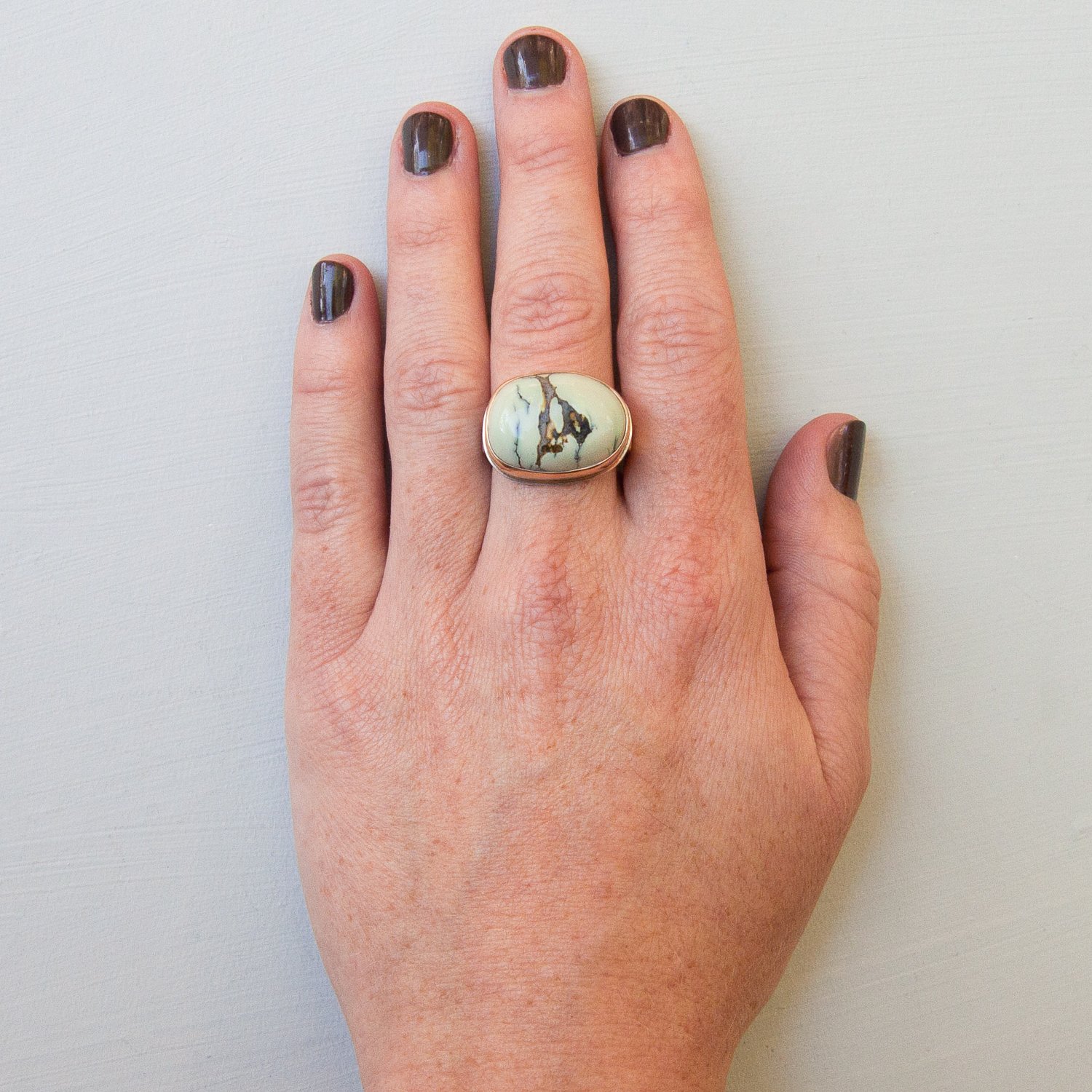 Jamie Joseph: SS & 14k Gold Ring w/ Oval Damele Turquoise on live Edge Band