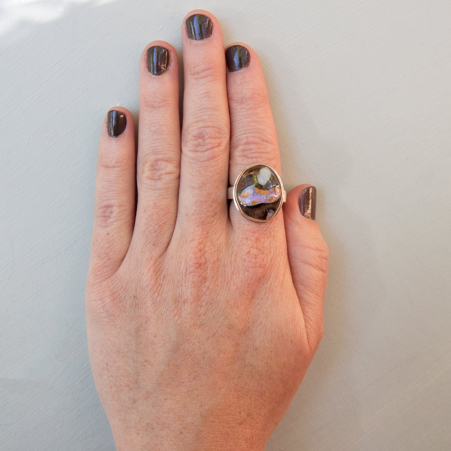 Jamie Joseph: SS & 14k Gold ring w/ Vertical Asymmetrical Boulder Opal on Tapered X band