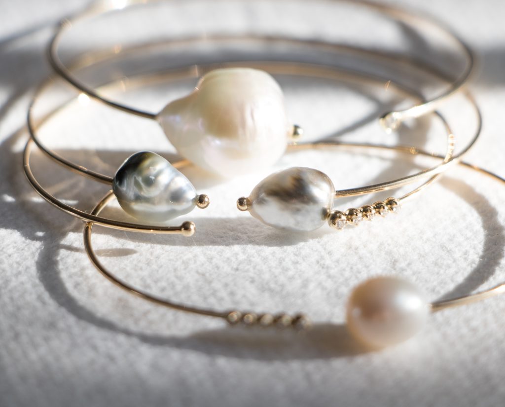 Gold bangle with pearl by Mizuki