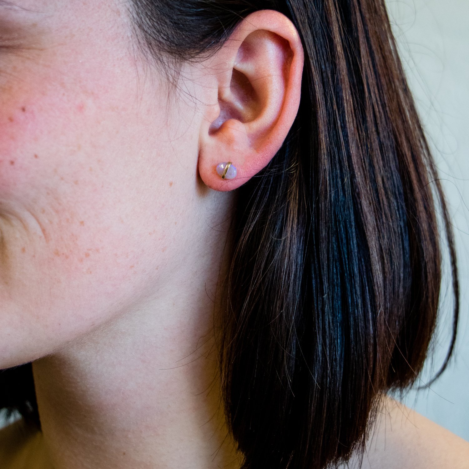 Melissa Joy Manning: 14K yellow gold limited edition gold opal and green tourmaline mismatch post earring