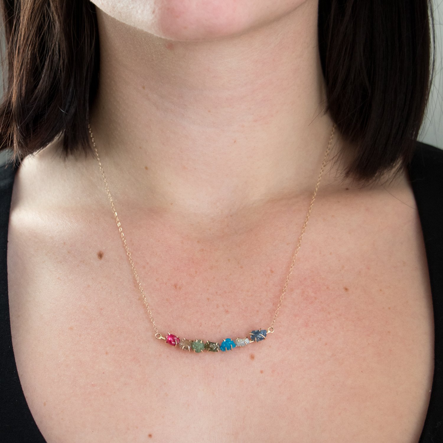 Melissa Joy Manning: 14K yellow gold stone necklace with ruby, topaz, peridot, apatite, moonstone, iolite, corundum LN2023G set like LN2024G