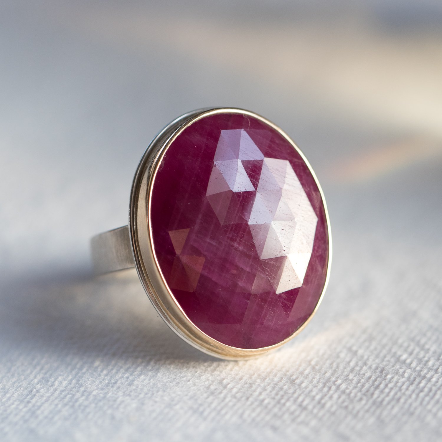 Jamie Joseph: SS & 14k Gold Ring w/ Large Vertical Faceted Oval Indian Ruby on Y Band