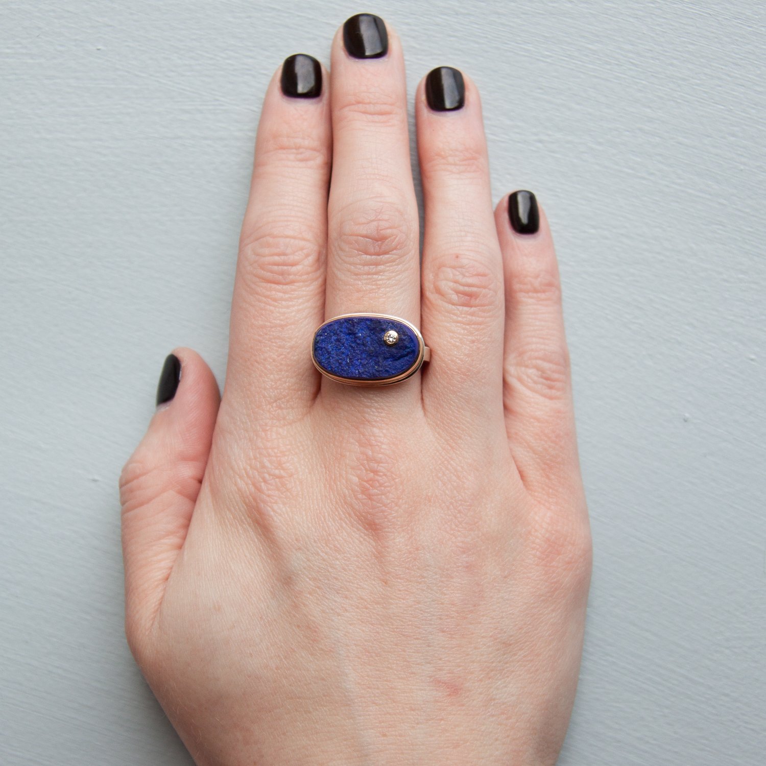 Jamie Joseph: SS & 14k Gold Ring w/ oval surface lapis & .03ct diamond on medium live edge band size 7
