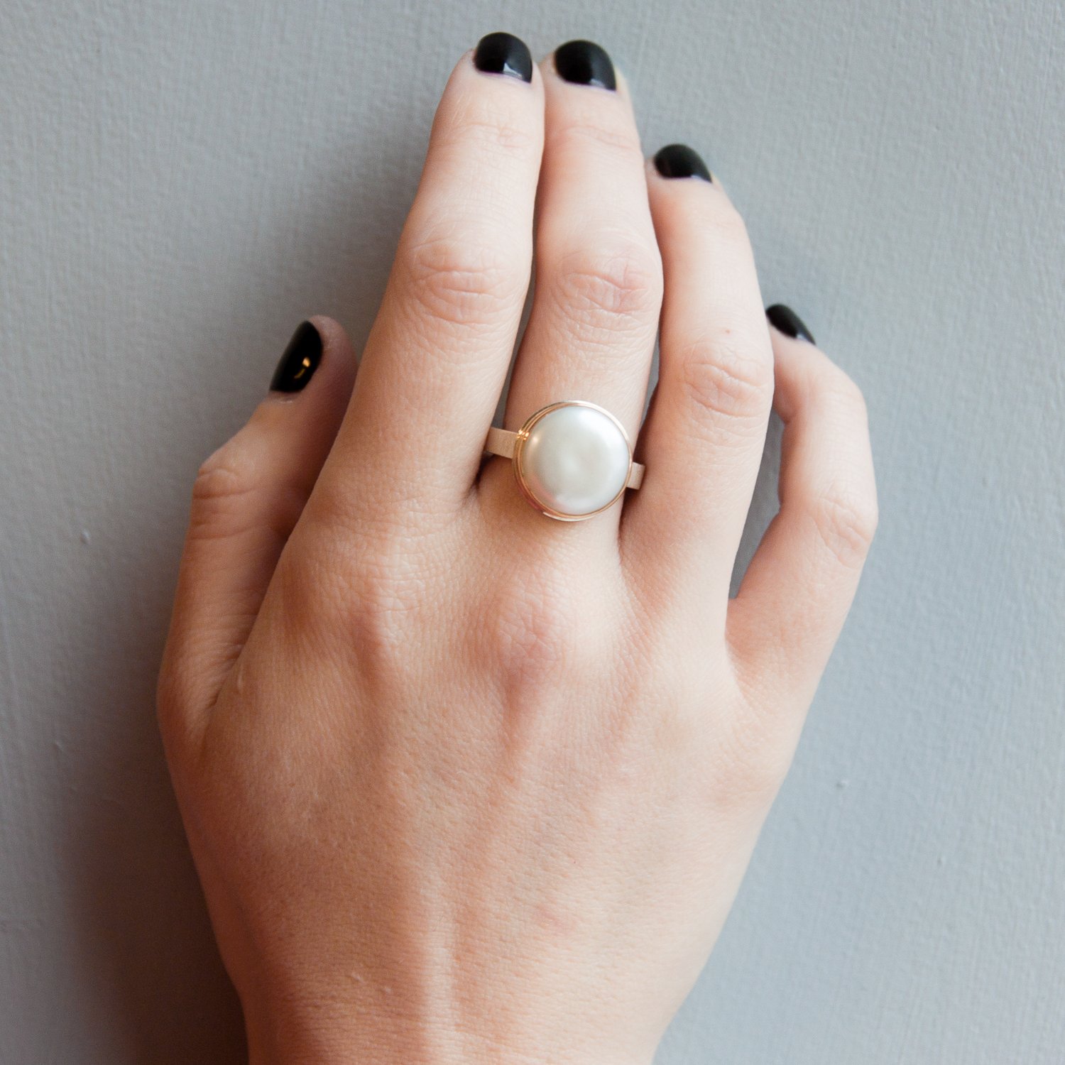 Jamie Joseph: SS & 14k Gold Ring w/ small round coin cultured white pearl on x band size 7