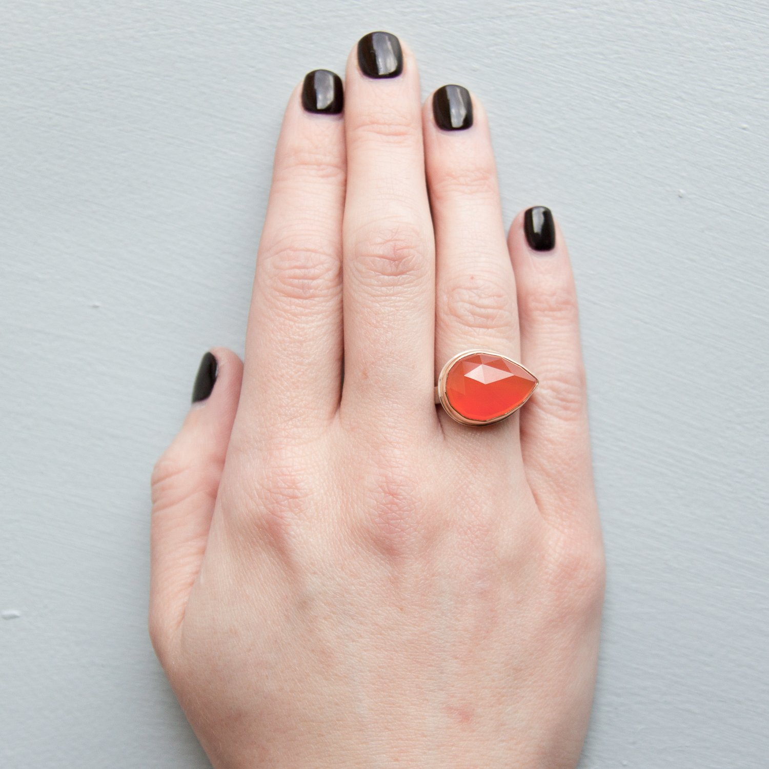 Jamie Joseph: SS & 14K gold ring w/ teardrop rose cut orange chalcedoney on x band sz 6.5