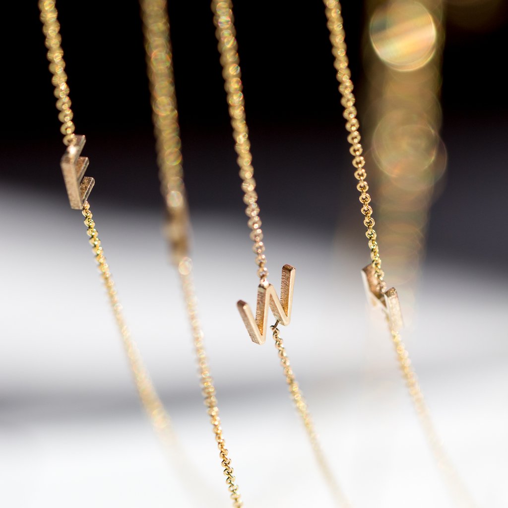 Maya Brenner gold W initial necklace