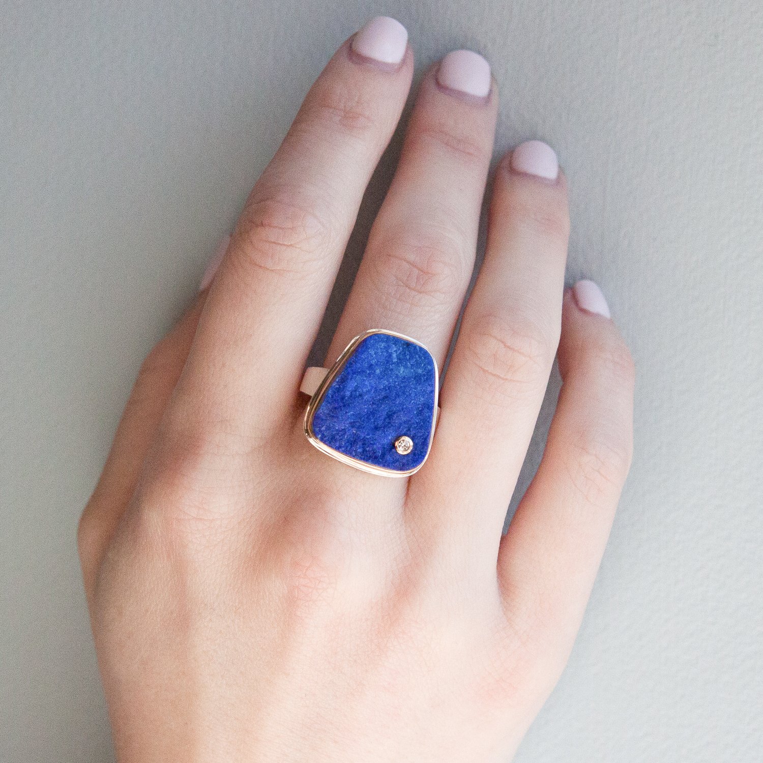 Jamie Joseph: SS & 14k gold ring w/ vertical trapezoid surface lapis & .03ct diamond on tapered x band