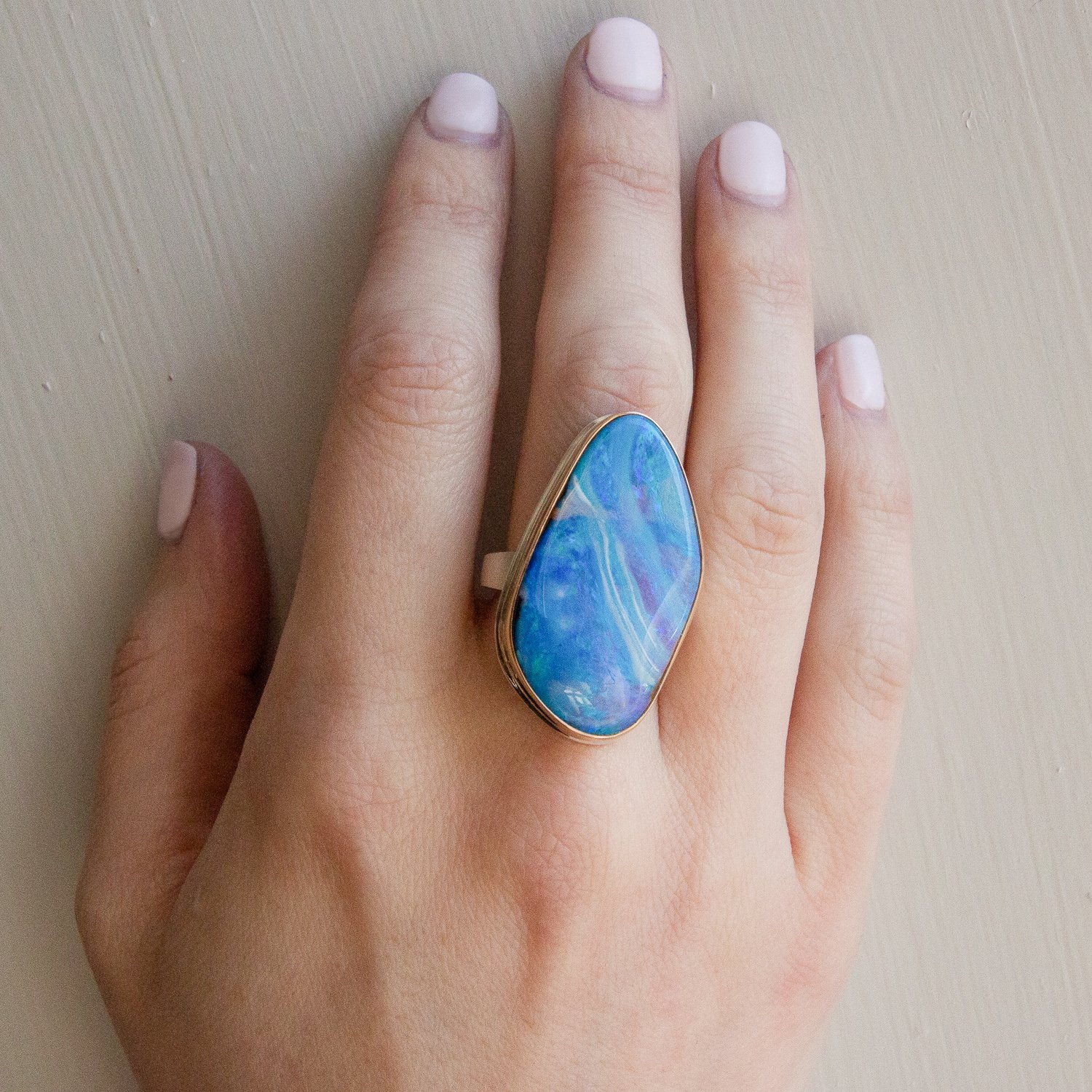 Jamie Joseph: SS and 14k gold ring w/ vertical asymmetrical boulder opal on tapered x band