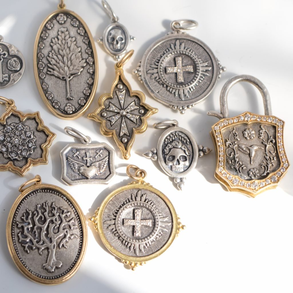 Gold and Silver charms by Erica Molinari