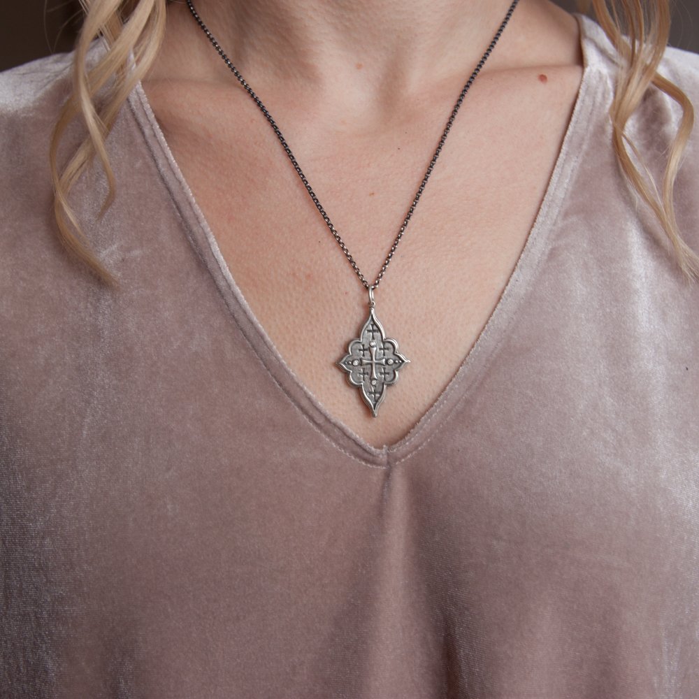 Erica Molinari Trunk Show: SS elongated 4 point latin multi cross charm "be what you are"