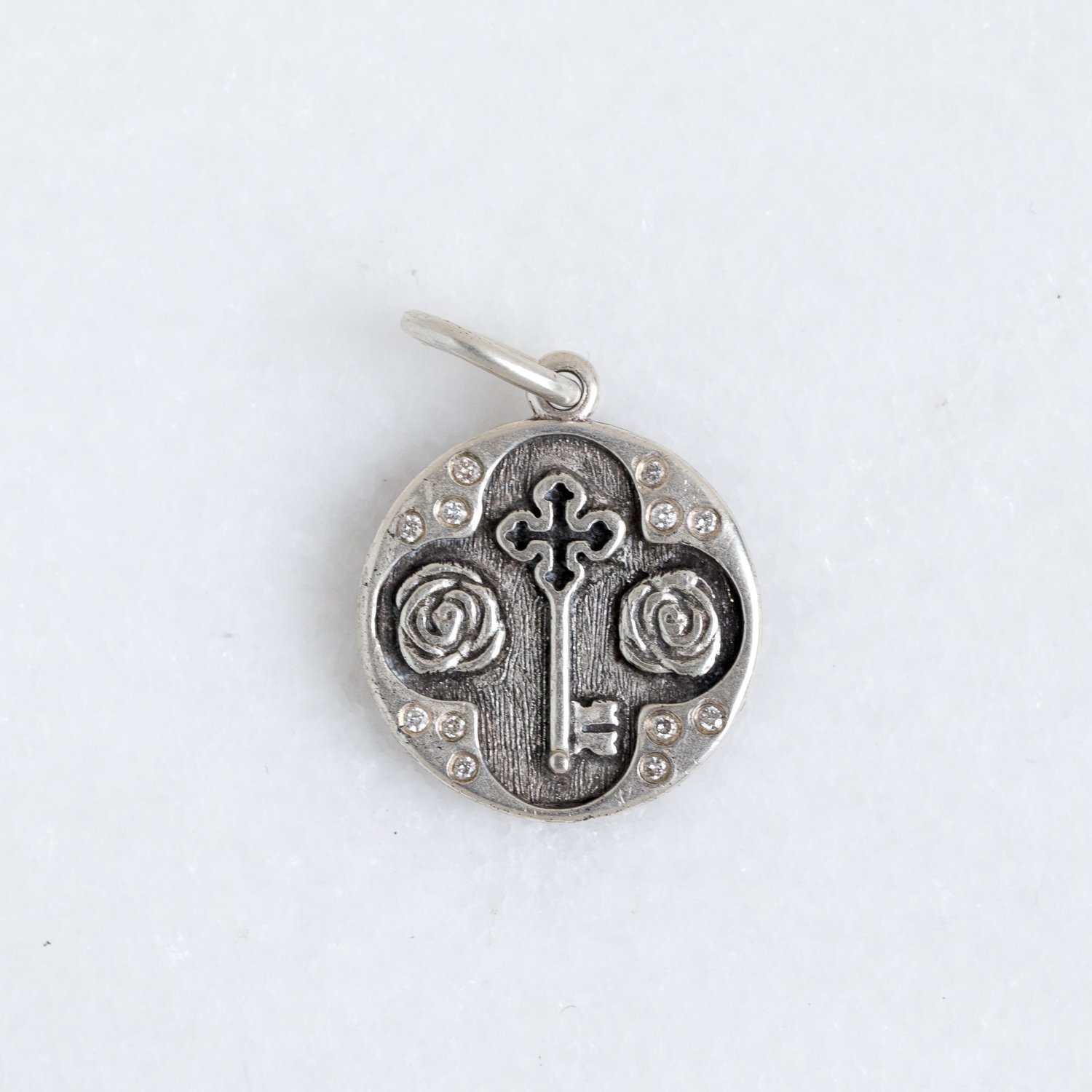 Erica Molinari Trunk Show: SS diamond key& rose "under the rose" .06cts