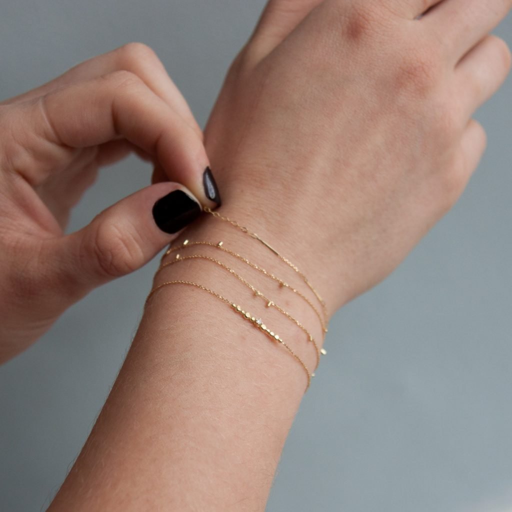 Gold chain bracelets by Sweet Pea jewelry