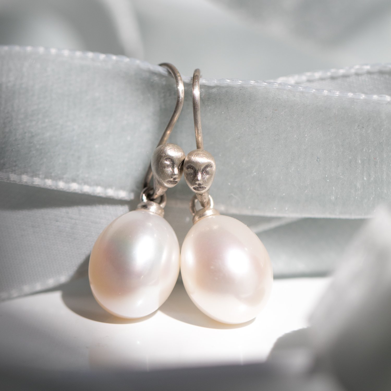 Hannah Blount: Oxidized sterling silver pearl figurehead cameo earring