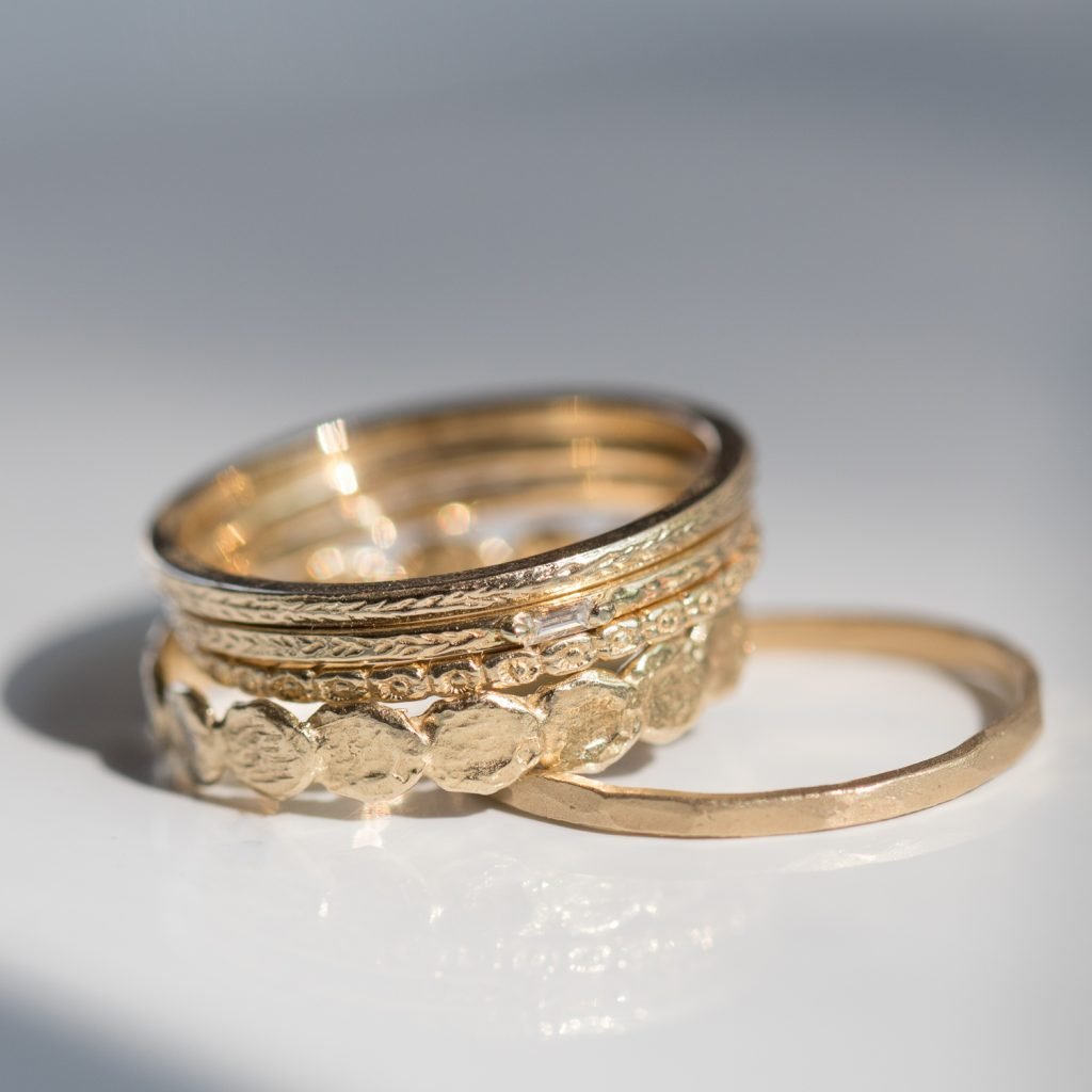 Gold stacking rings by Victoria Cunningham