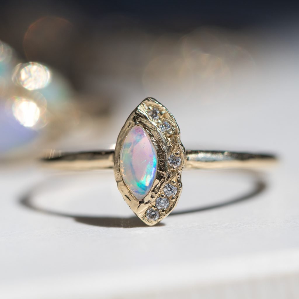Gold ring with opal stone and white diamonds by Misa Jewelry