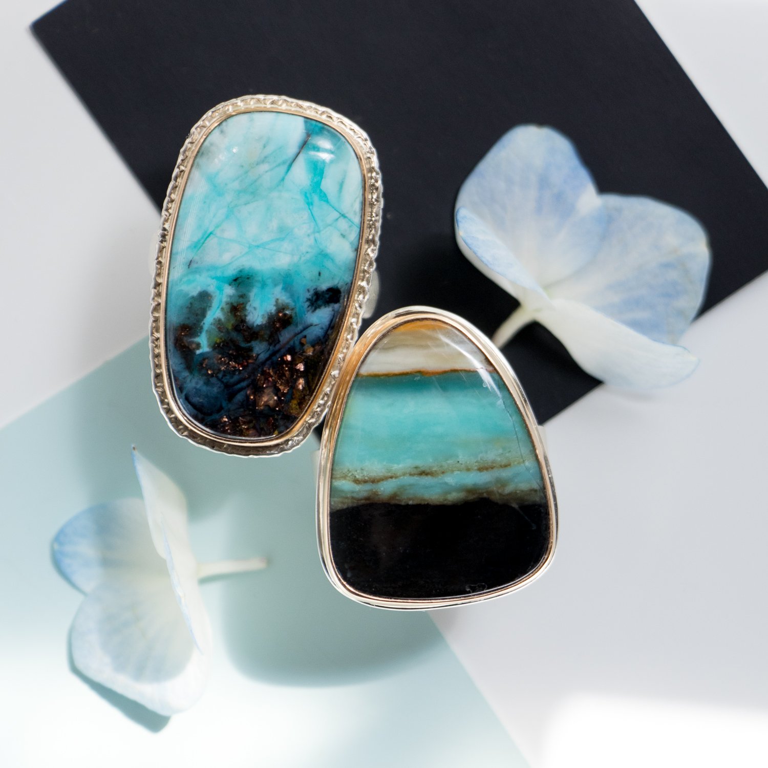 Jamie Joseph: sterling 14k gold ring w/ large vertical asymmetrical smooth indonesian blue petrified opalized wood on tapered X band