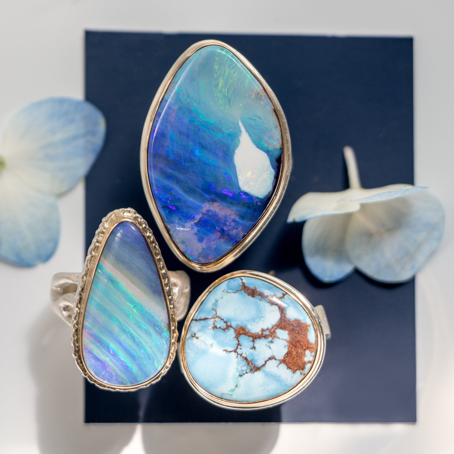 Jamie Joseph: SS and 14k Gold Ring w/ teardrop boulder opal on lava platform/madrona band