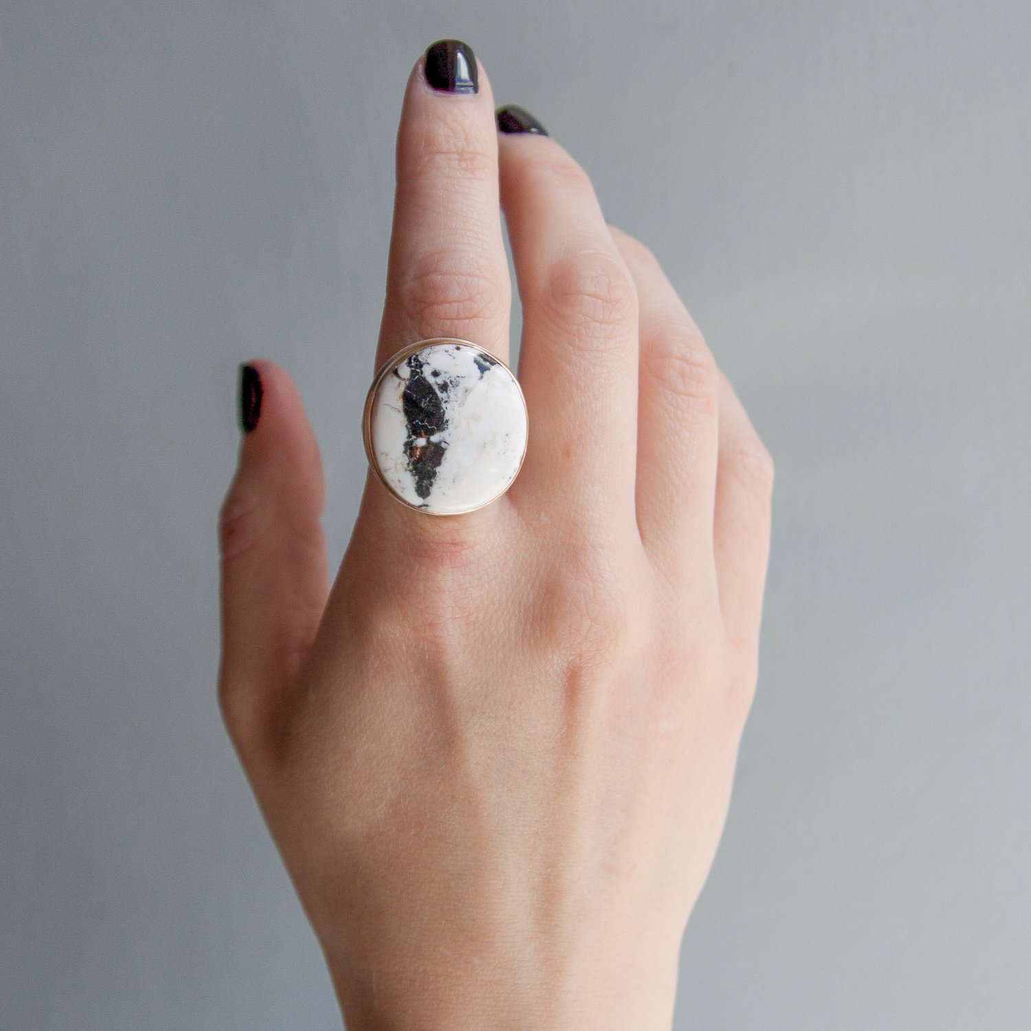 Jamie Joseph: SS and 14k Gold Ring w/ oval white buffalo turquoise on groovy band
