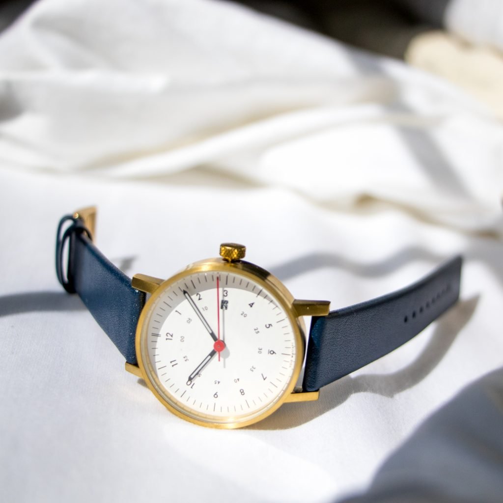 Gold watch with royal blue band by Void Watches