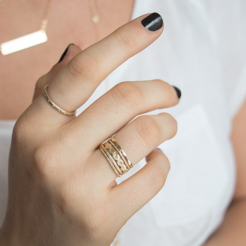 Gold stacking rings by jewelry artist Victoria Cunningham