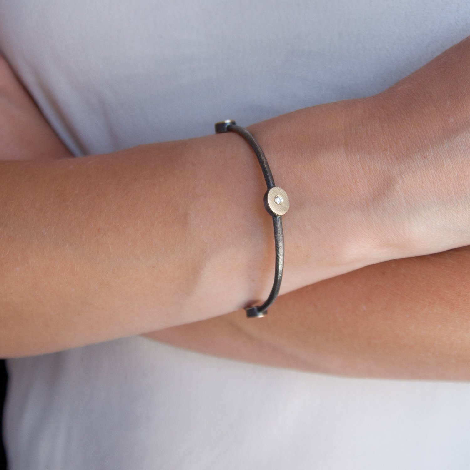 Rene Escobar: S.Silver, 18k and diamond accent bracelet (0.12 tcw)
