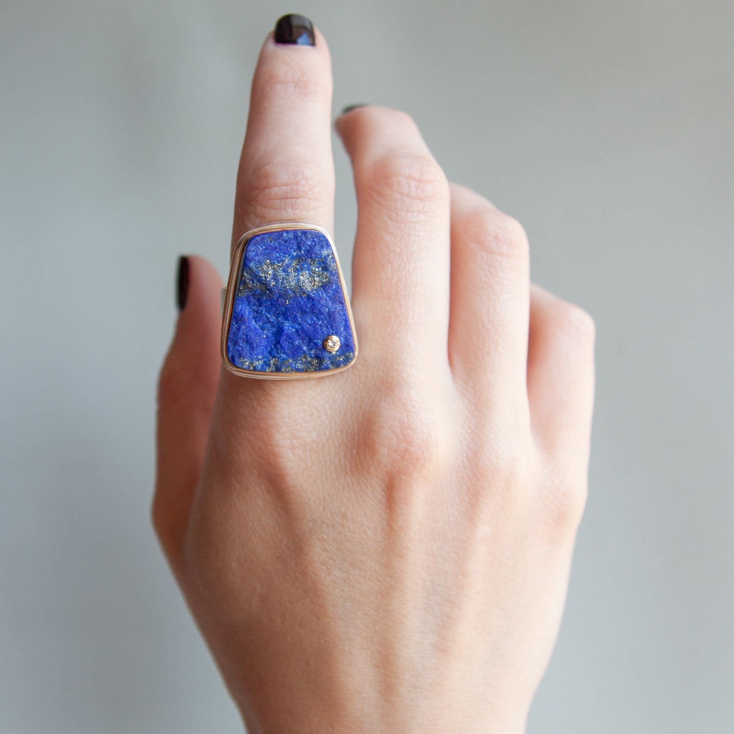 Jamie Joseph: SS and 14k Gold Ring w/ surface cut lapis trapezoid .03 diamond on pumice band