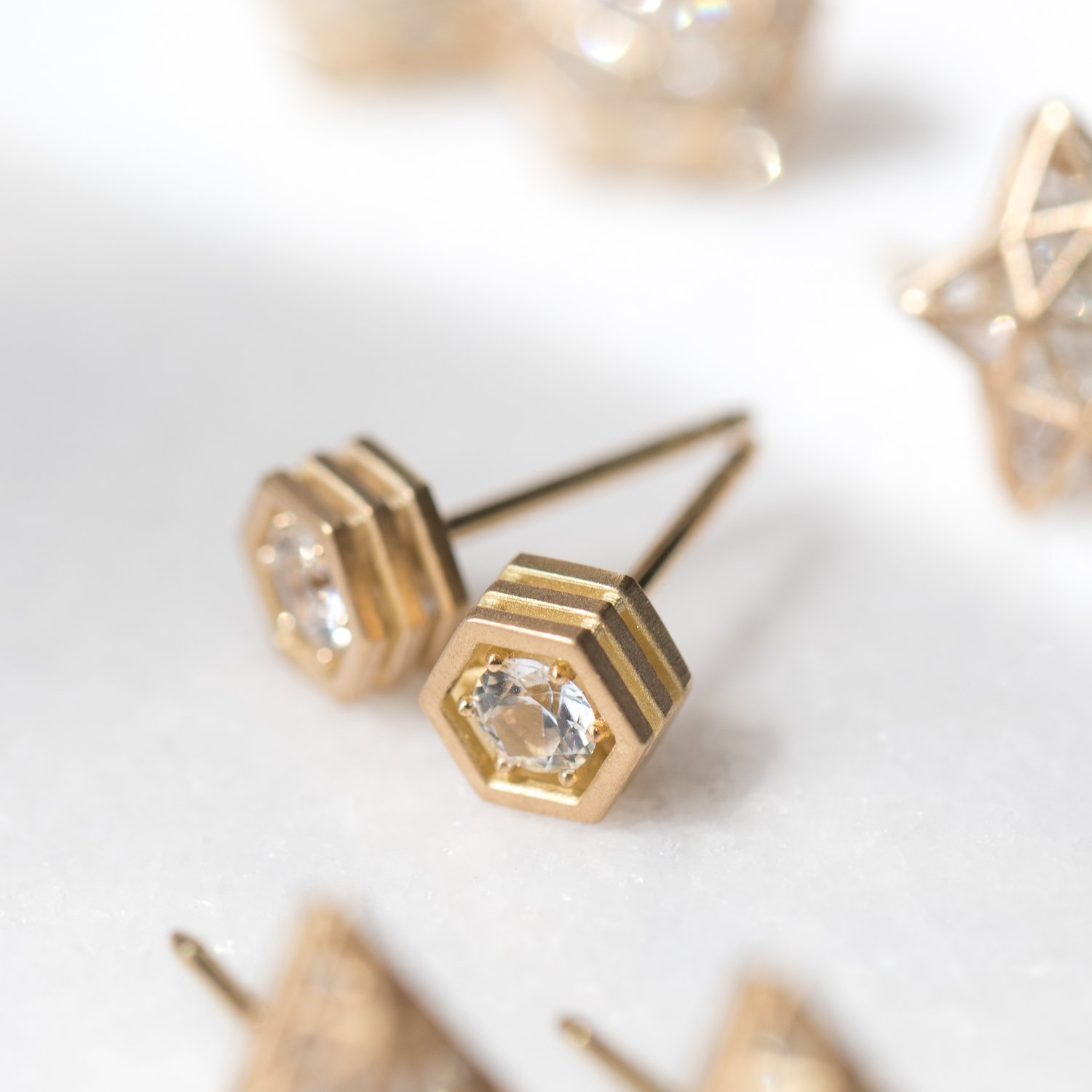 Roule: Three storey hexy single stud earrings 18K gold white sapphires .39cts