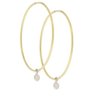 gold earrings with diamonds by jewelry designer ila