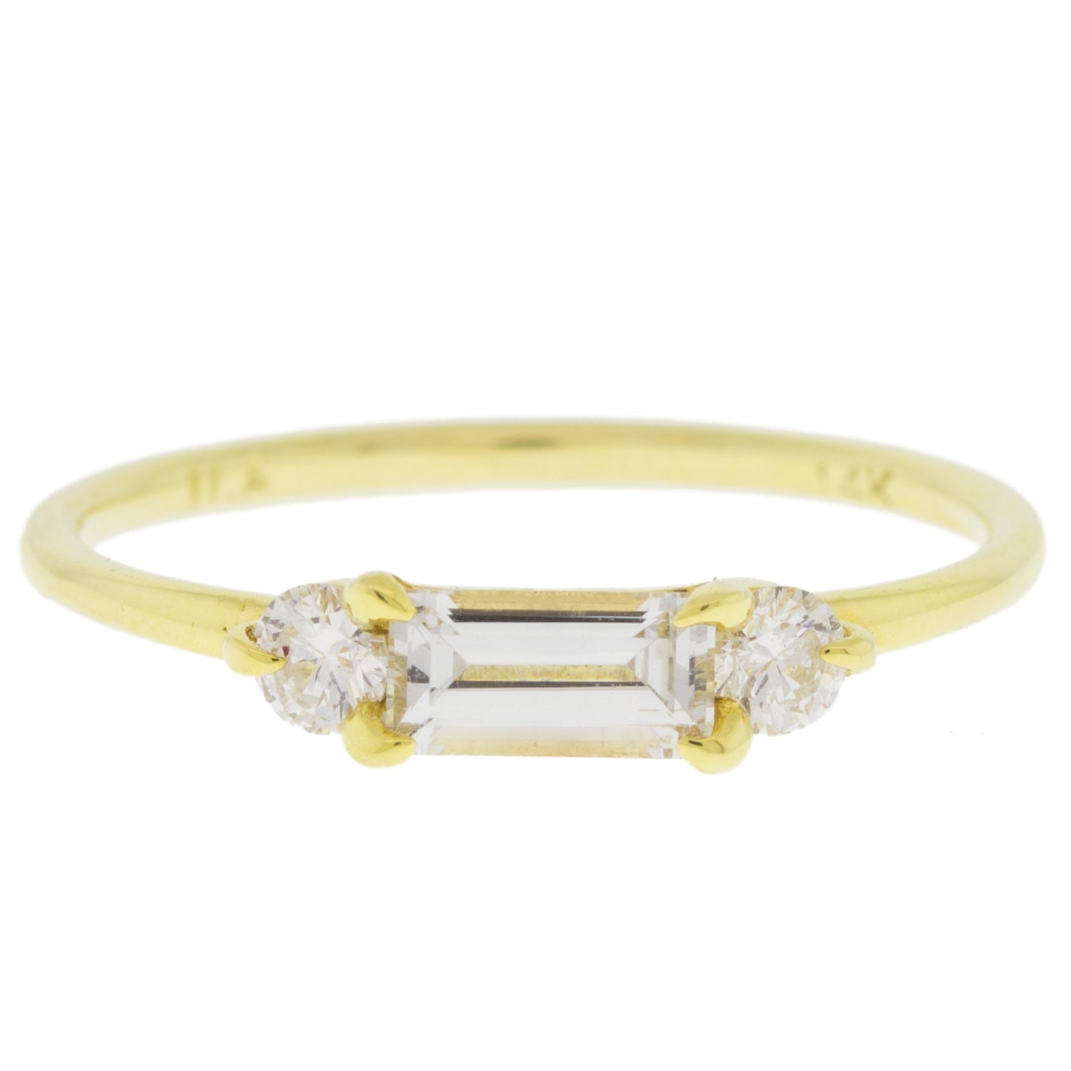 gold ring with sapphire and diamond by jewelry designer ila