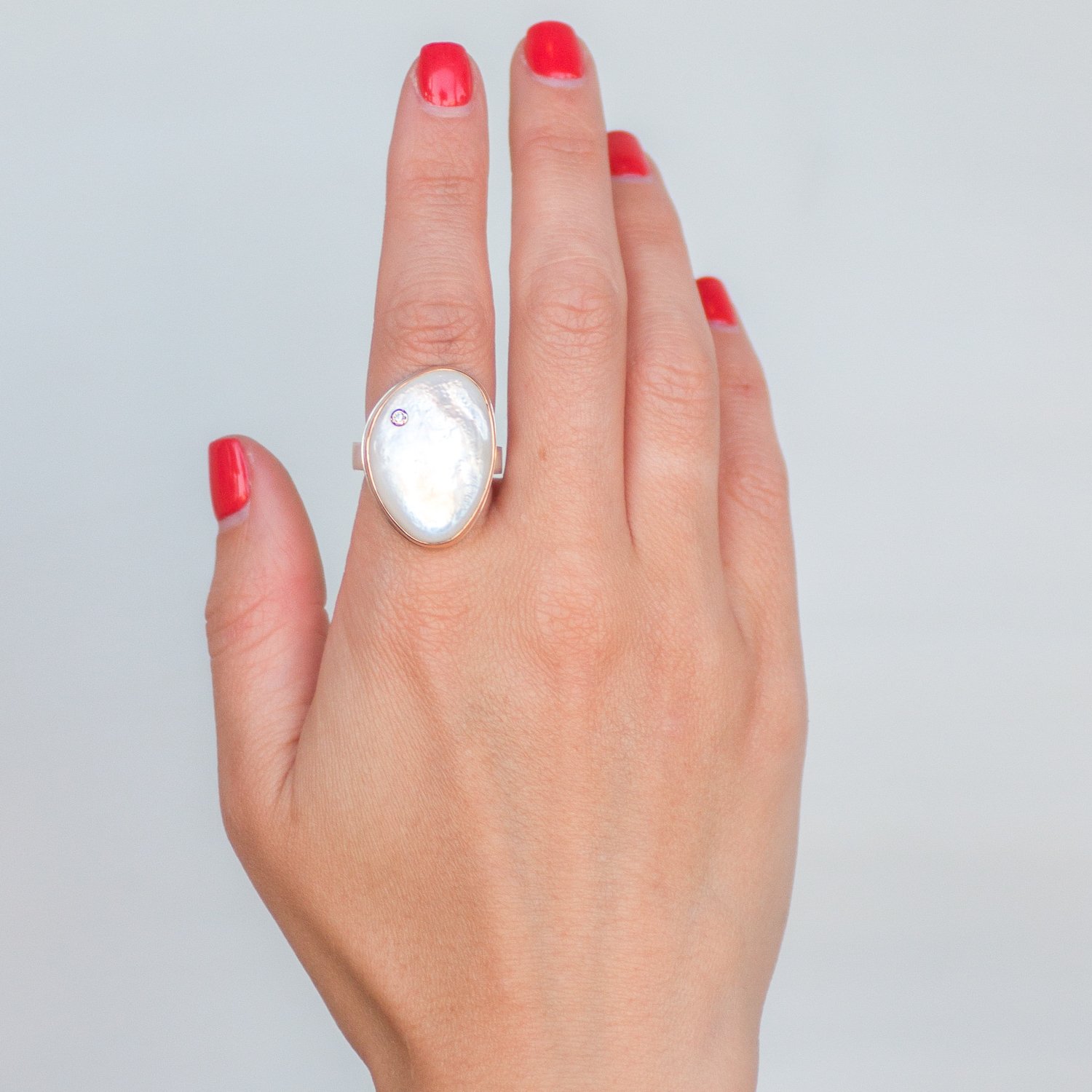 Jamie Joseph: SS and 14K gold ring with vertical smooth asymmetrical mother of pearl and .03ct diamond size 7 1x3/4