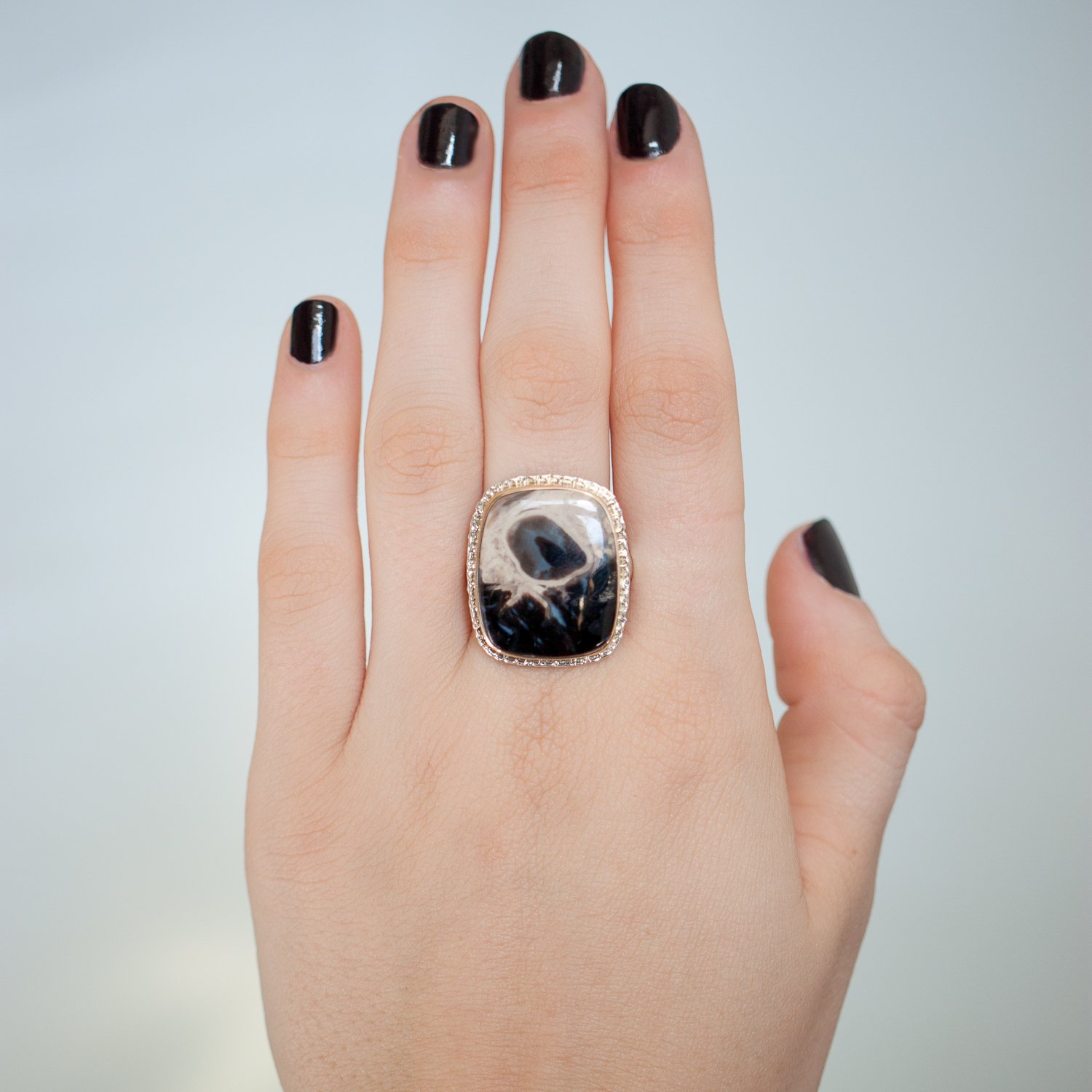 Jamie Joseph: SS and 14K gold ring with vertical rectangular fossilized palm wood on lava platform and comfort band size 8 13/16x11/16